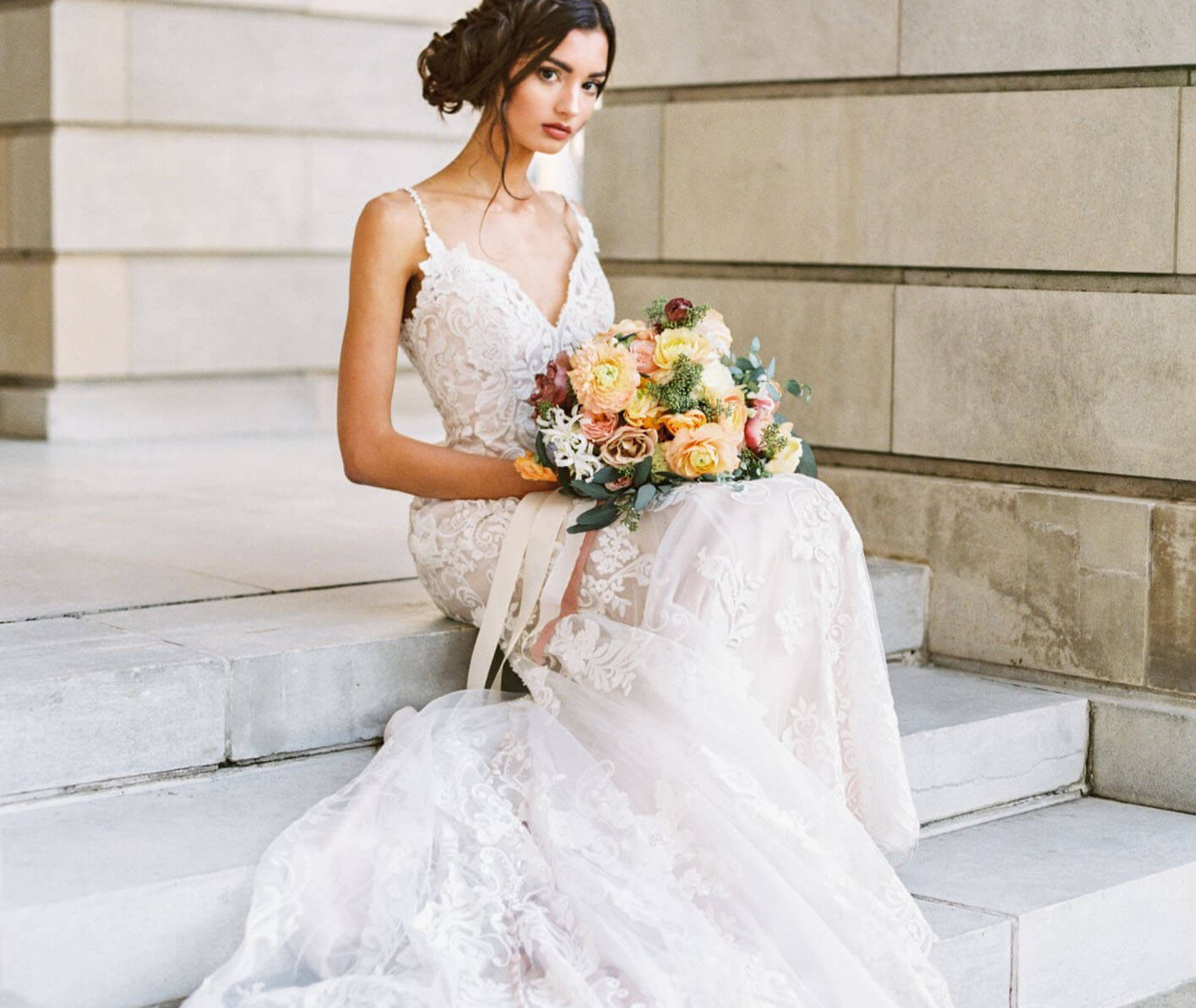 Model wearing a white gown